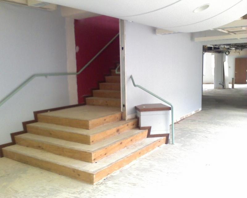 Demolition and removal of wall beside stair case